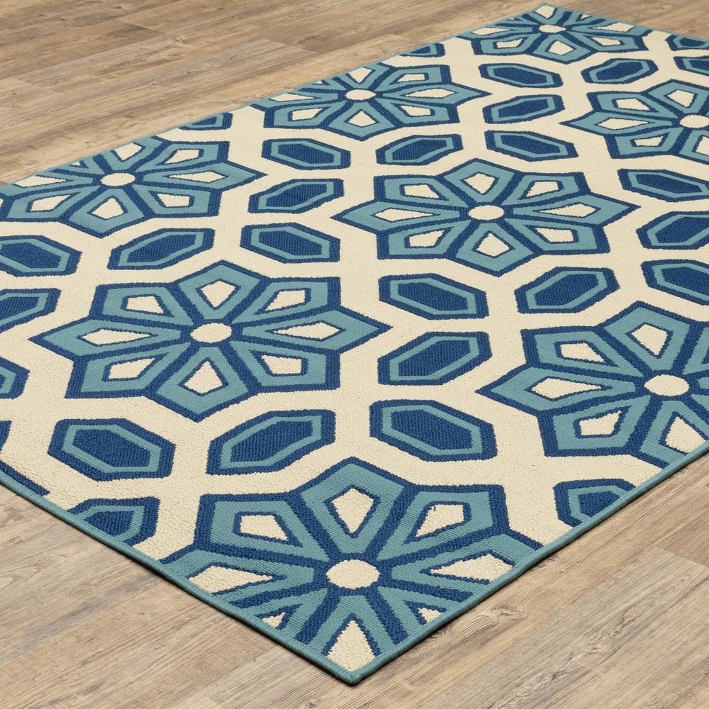 2' X 4' Ivory and Blue Geometric Stain Resistant Indoor Outdoor Area Rug. Picture 6