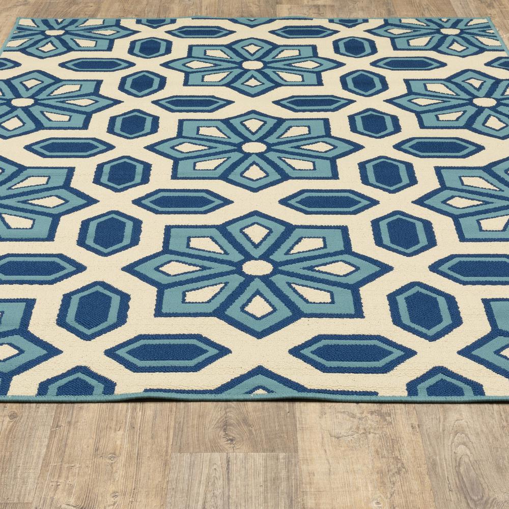 2' X 4' Ivory and Blue Geometric Stain Resistant Indoor Outdoor Area Rug. Picture 8