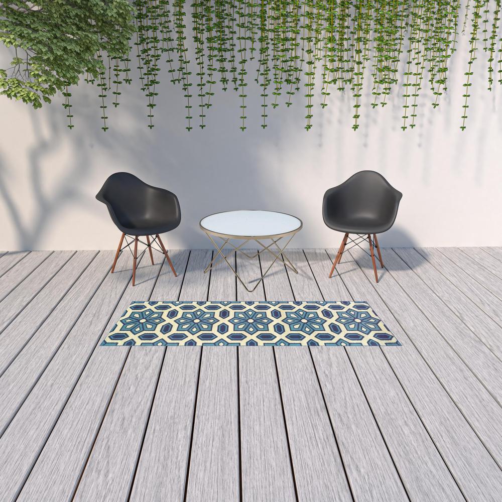 2' X 8' Ivory and Blue Geometric Stain Resistant Indoor Outdoor Area Rug. Picture 2
