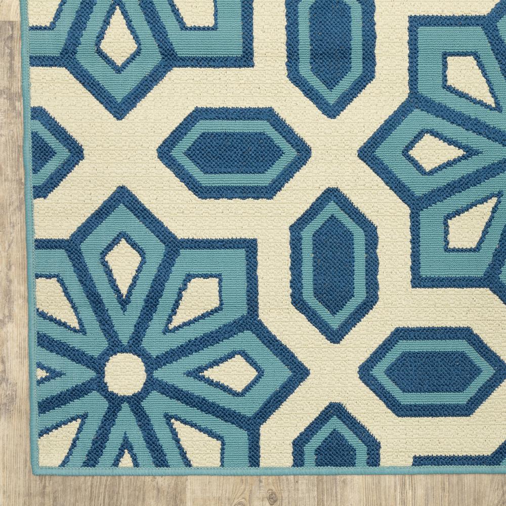 2' X 8' Ivory and Blue Geometric Stain Resistant Indoor Outdoor Area Rug. Picture 4