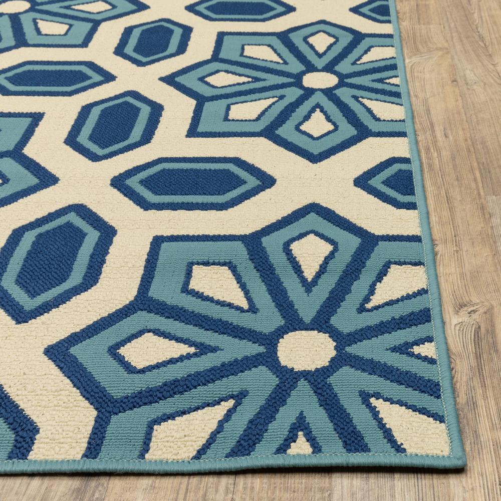 2' X 8' Ivory and Blue Geometric Stain Resistant Indoor Outdoor Area Rug. Picture 5