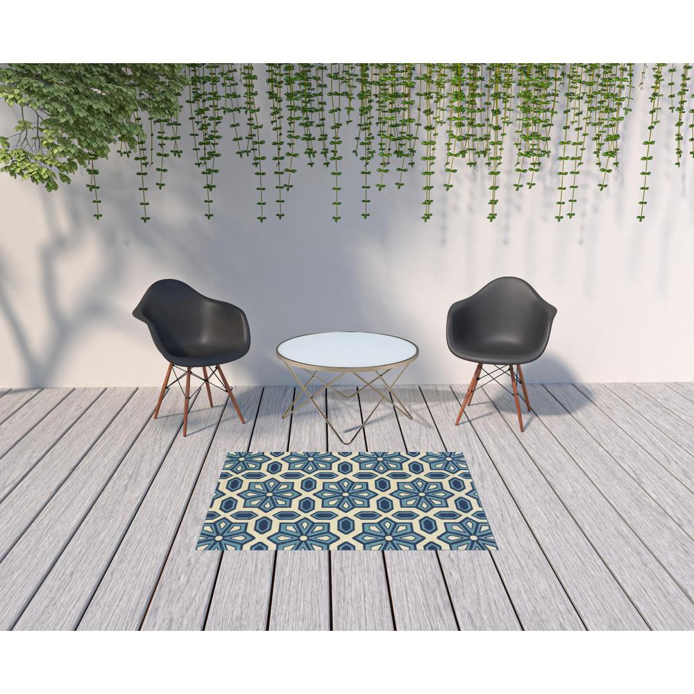 4' x 6' Ivory and Blue Geometric Stain Resistant Indoor Outdoor Area Rug. Picture 2