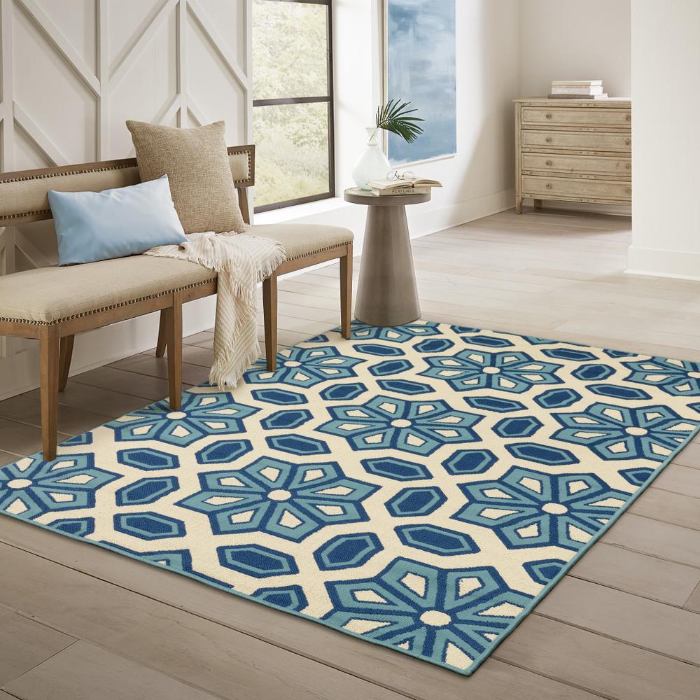 4' x 6' Ivory and Blue Geometric Stain Resistant Indoor Outdoor Area Rug. Picture 9
