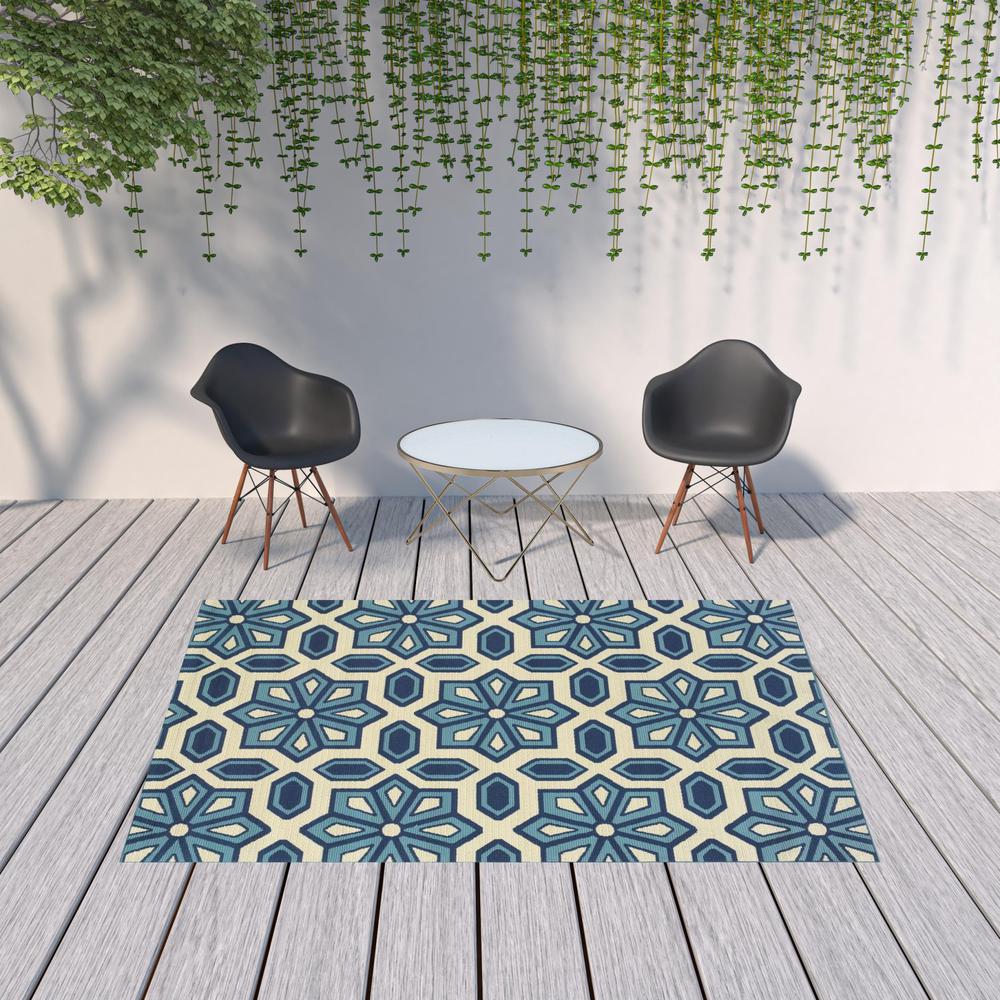 7' x 10' Ivory and Blue Geometric Stain Resistant Indoor Outdoor Area Rug. Picture 2