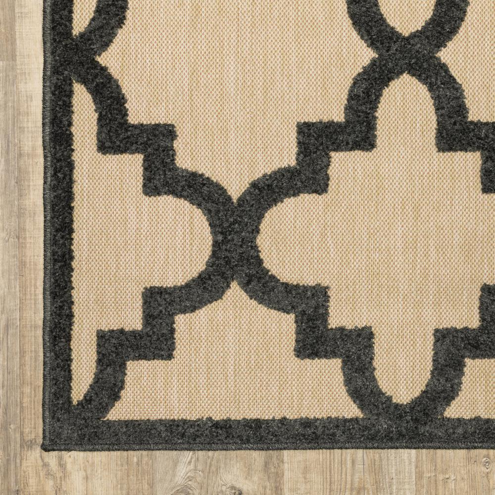 2' X 8' Beige and Black Geometric Stain Resistant Indoor Outdoor Area Rug. Picture 4