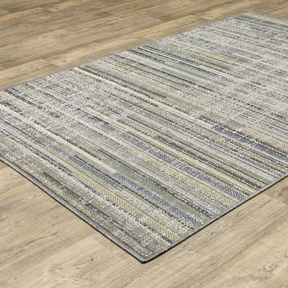 7' x 9' Blue and Green Abstract Stain Resistant Indoor Outdoor Area Rug. Picture 5