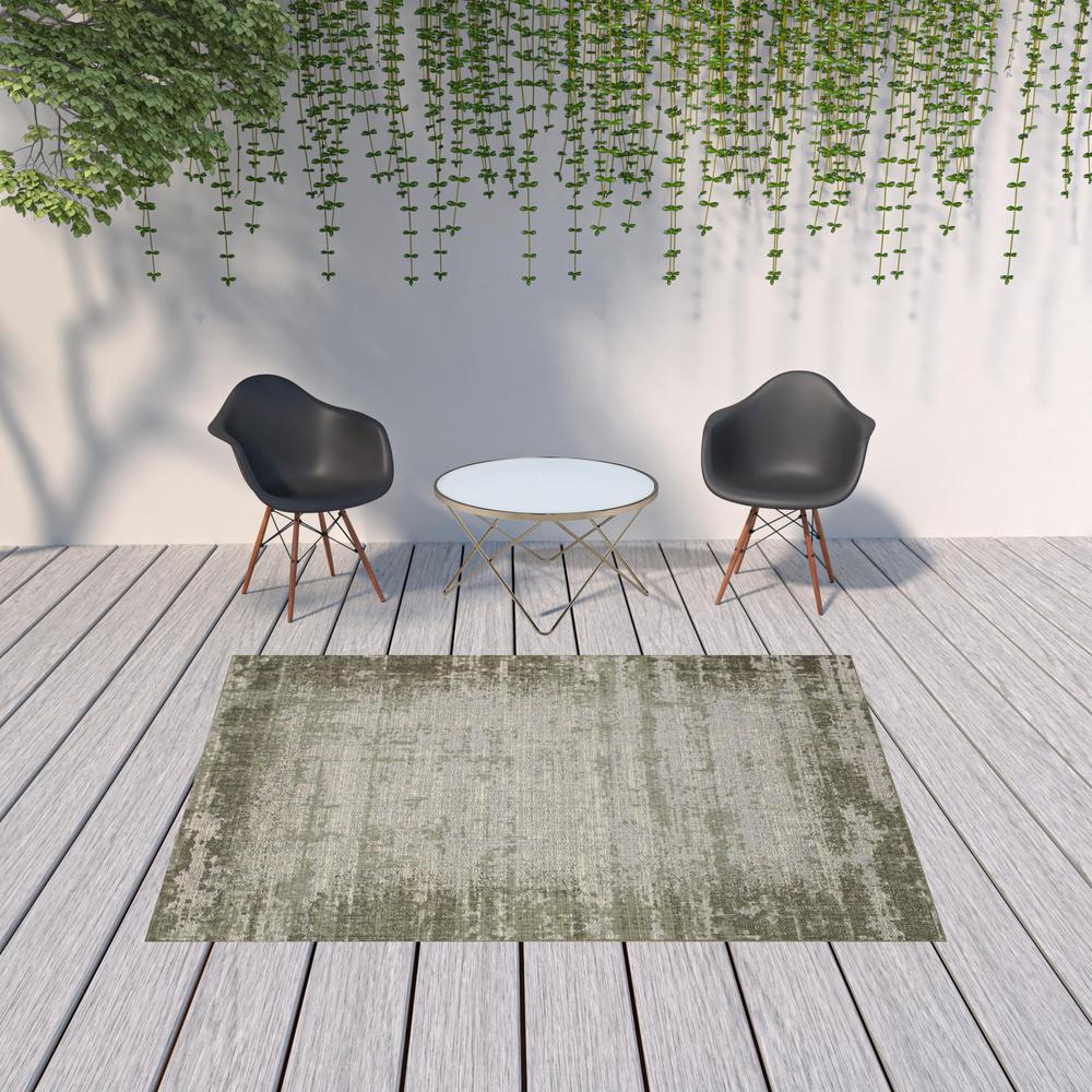 7' x 9' Green and Ivory Abstract Stain Resistant Indoor Outdoor Area Rug. Picture 3