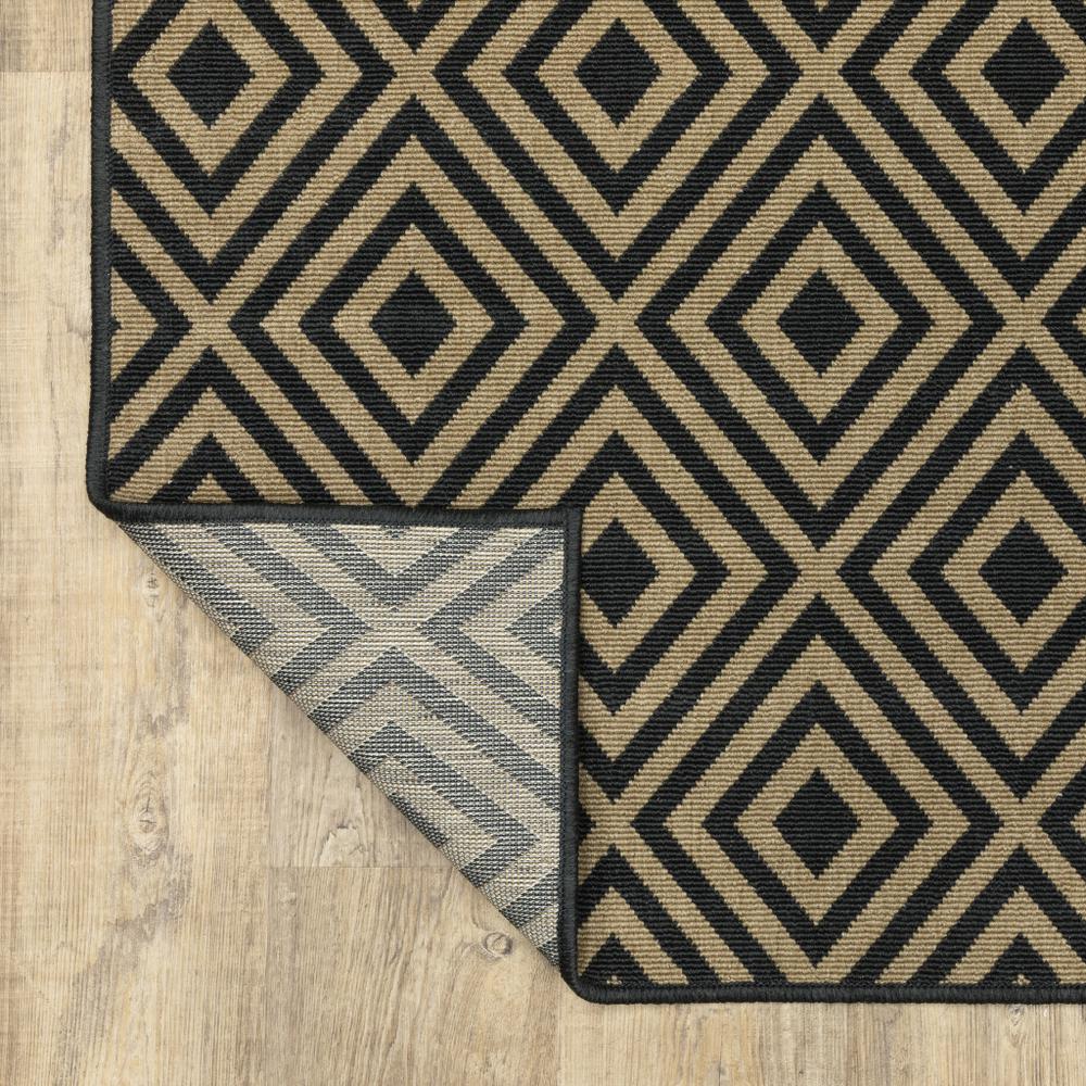 2' X 4' Black and Tan Geometric Stain Resistant Indoor Outdoor Area Rug. Picture 7