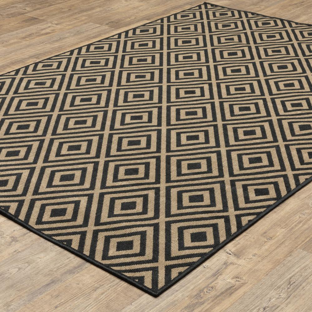 8' x 11' Black and Tan Geometric Stain Resistant Indoor Outdoor Area Rug. Picture 5