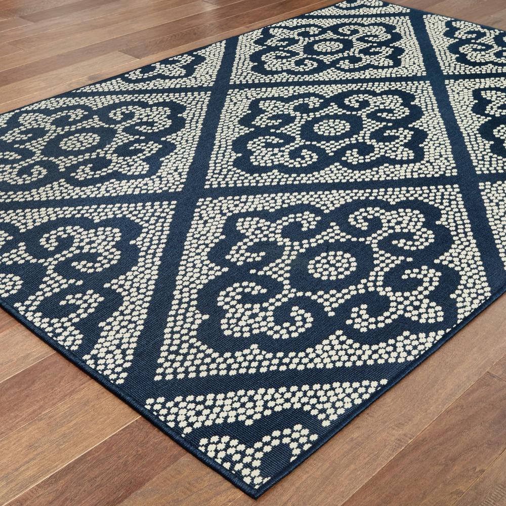 2' X 4' Blue and Ivory Geometric Stain Resistant Indoor Outdoor Area Rug. Picture 4