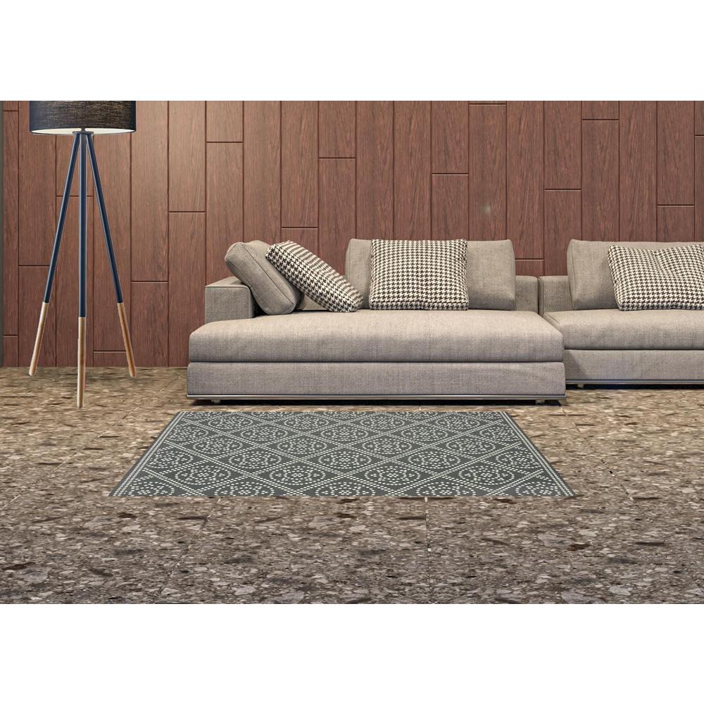 2' X 4' Gray and Ivory Geometric Stain Resistant Indoor Outdoor Area Rug. Picture 2