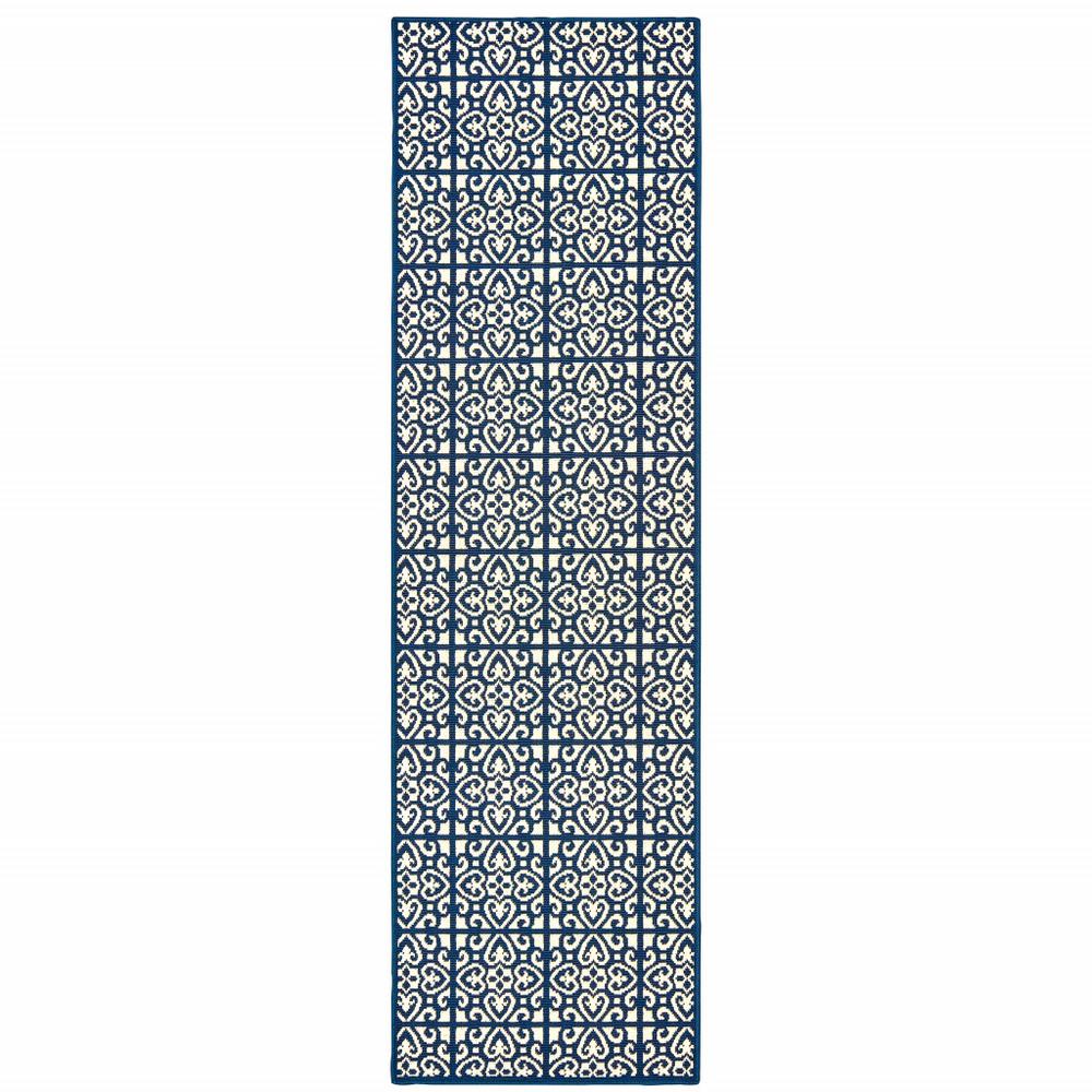 2' X 8' Ivory and Blue Geometric Stain Resistant Indoor Outdoor Area Rug. Picture 1