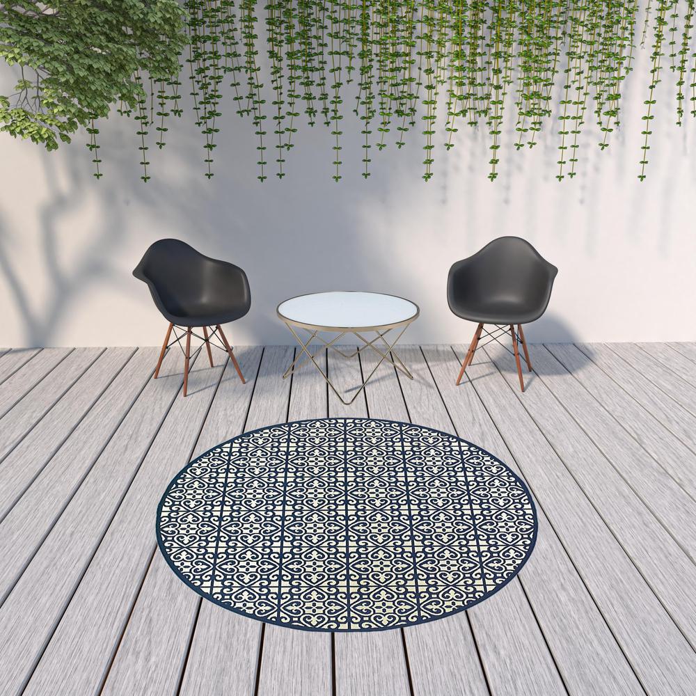 8' x 8' Ivory and Blue Round Geometric Stain Resistant Indoor Outdoor Area Rug. Picture 3