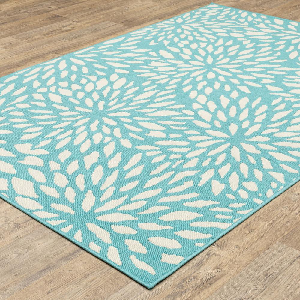 7' x 10' Blue and Ivory Floral Stain Resistant Indoor Outdoor Area Rug. Picture 5