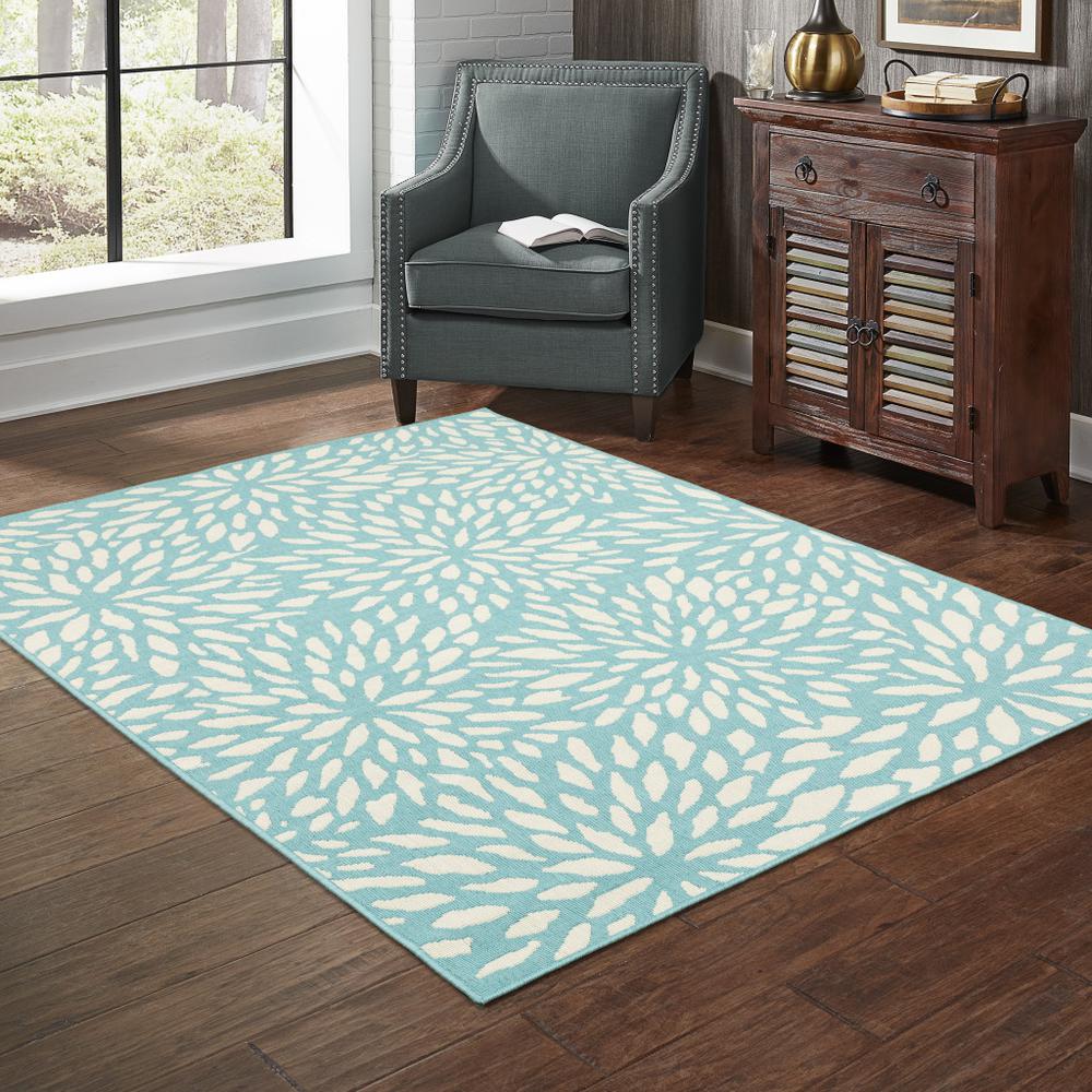 9' X 13' Blue and Ivory Floral Stain Resistant Indoor Outdoor Area Rug. Picture 8