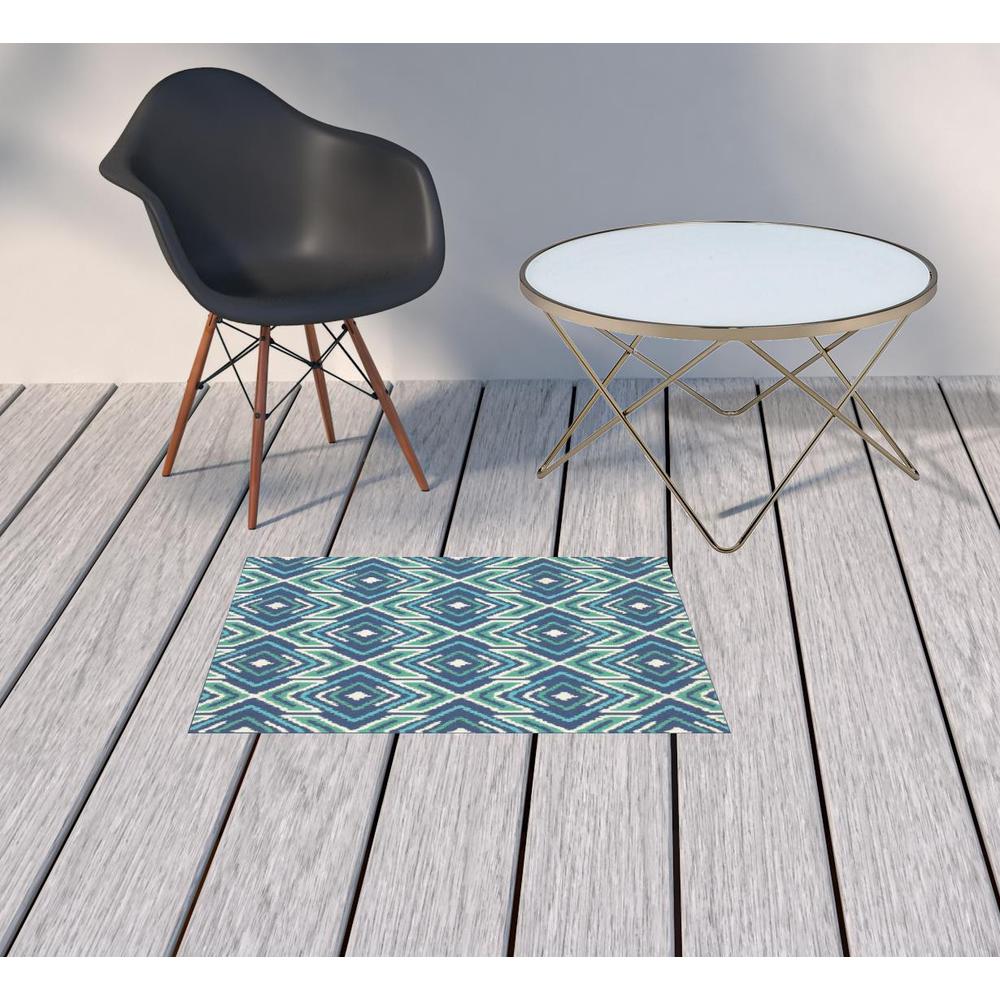 2' x 3' Blue and Ivory Geometric Stain Resistant Indoor Outdoor Area Rug. Picture 2