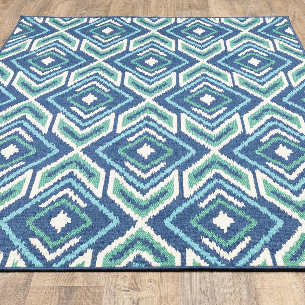 8' x 11' Blue and Ivory Geometric Stain Resistant Indoor Outdoor Area Rug. Picture 9