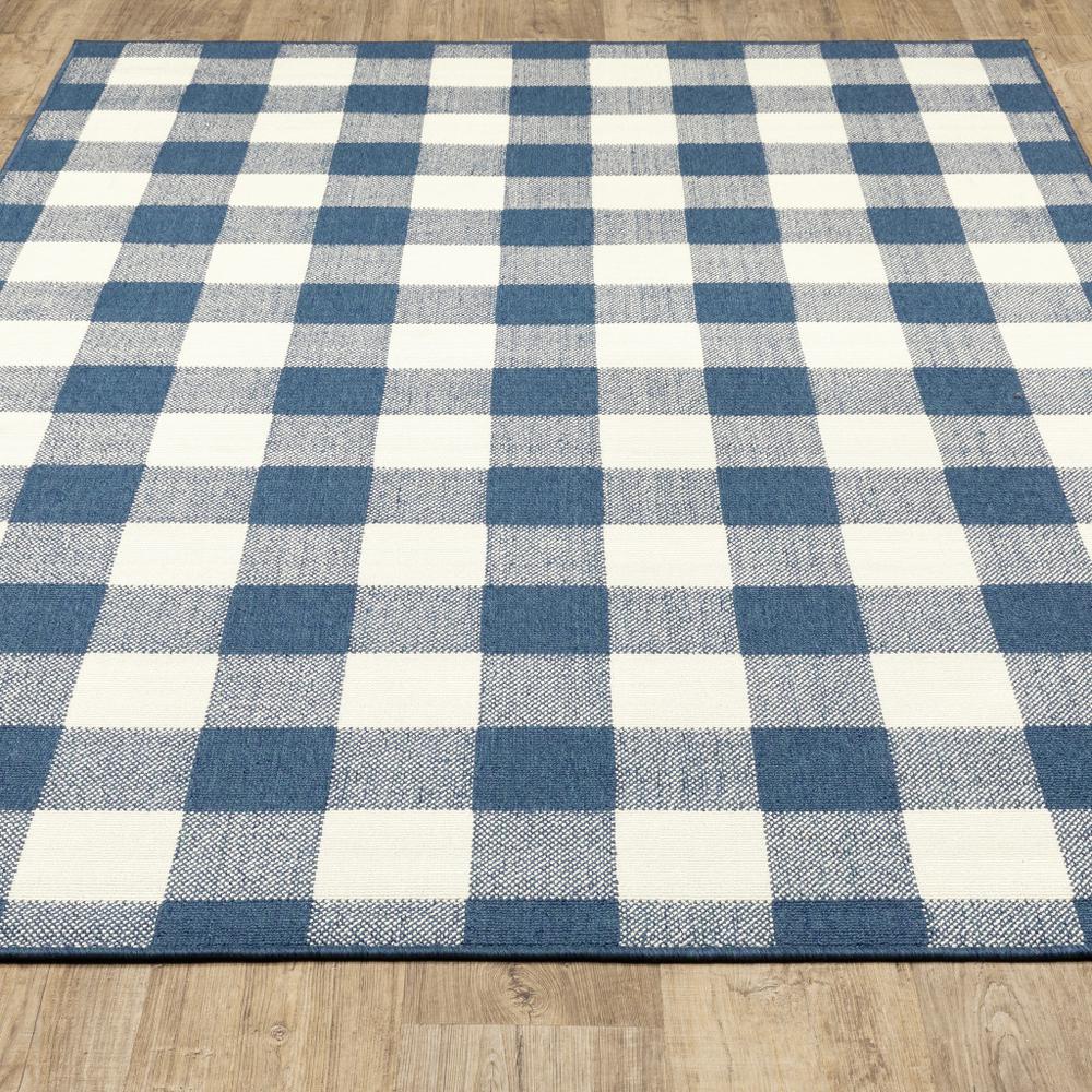 9' X 13' Blue and Ivory Geometric Stain Resistant Indoor Outdoor Area Rug. Picture 9