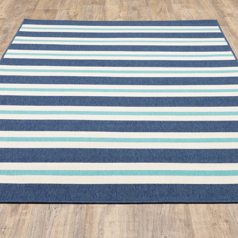 5' x 8' Blue and Ivory Geometric Stain Resistant Indoor Outdoor Area Rug. Picture 9