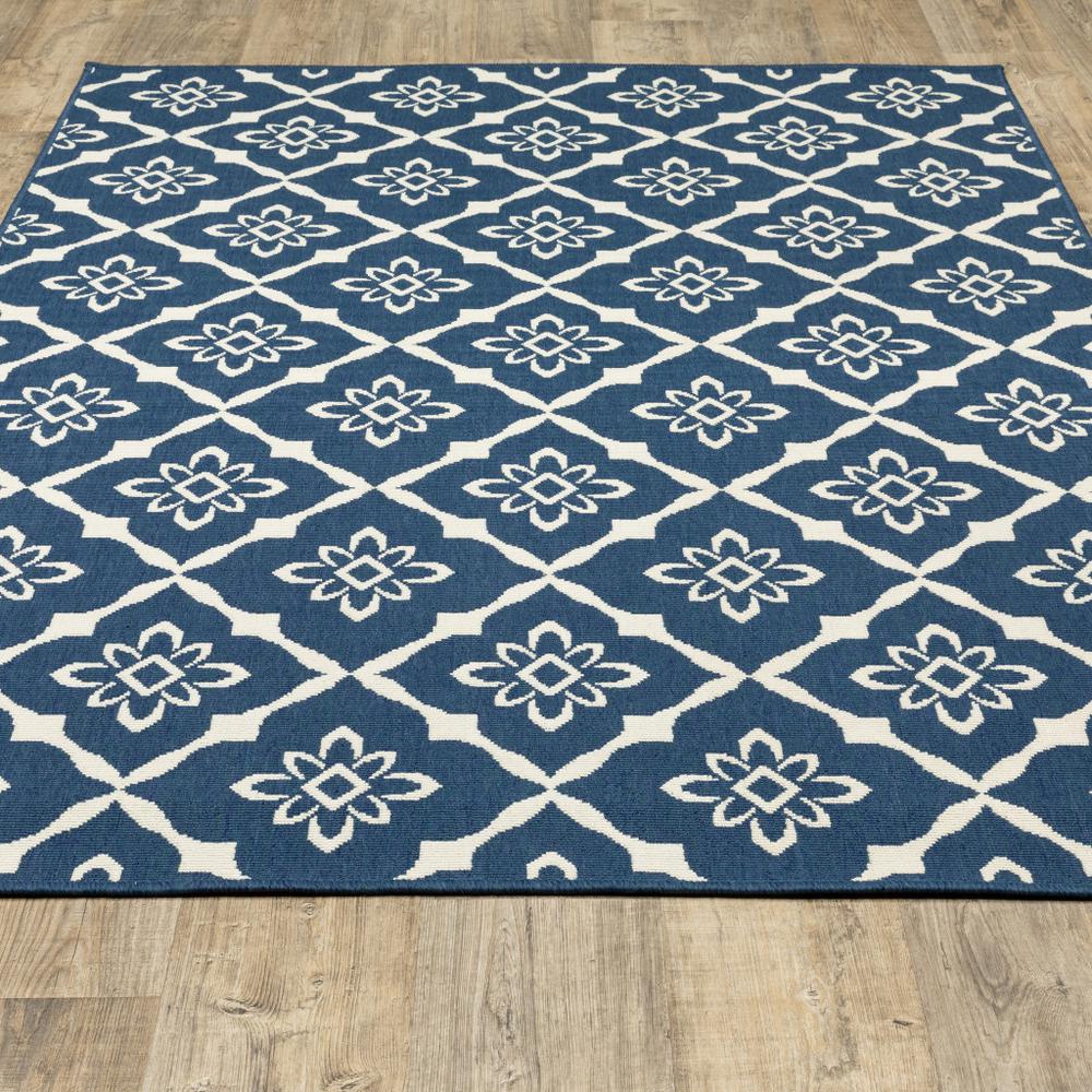2' x 3' Blue and Ivory Floral Stain Resistant Indoor Outdoor Area Rug. Picture 9