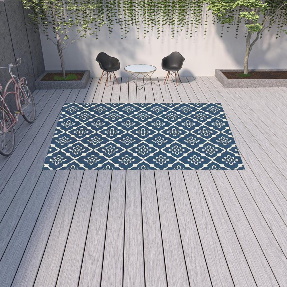 9' X 13' Blue and Ivory Floral Stain Resistant Indoor Outdoor Area Rug. Picture 2