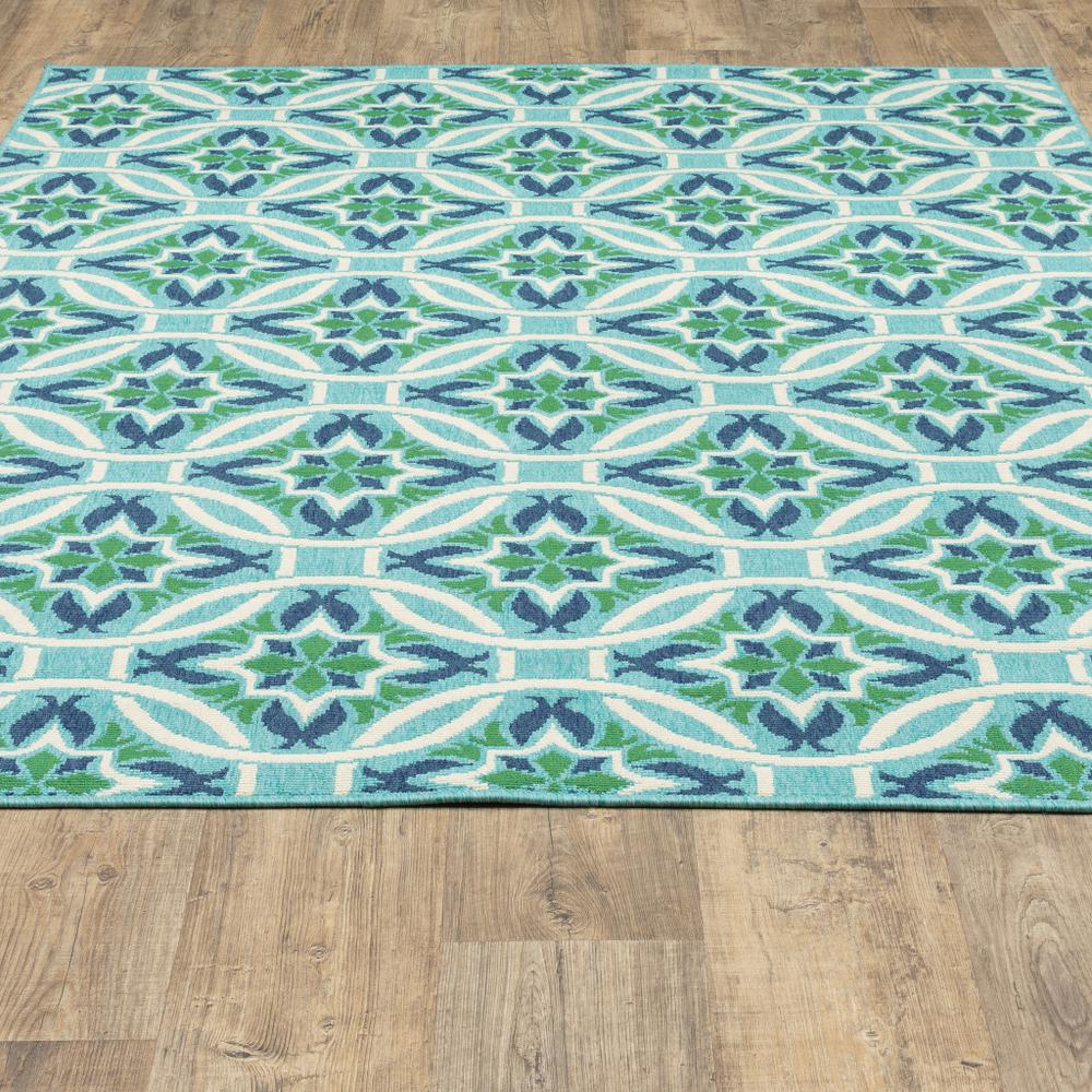 5' x 8' Blue and Green Geometric Stain Resistant Indoor Outdoor Area Rug. Picture 7