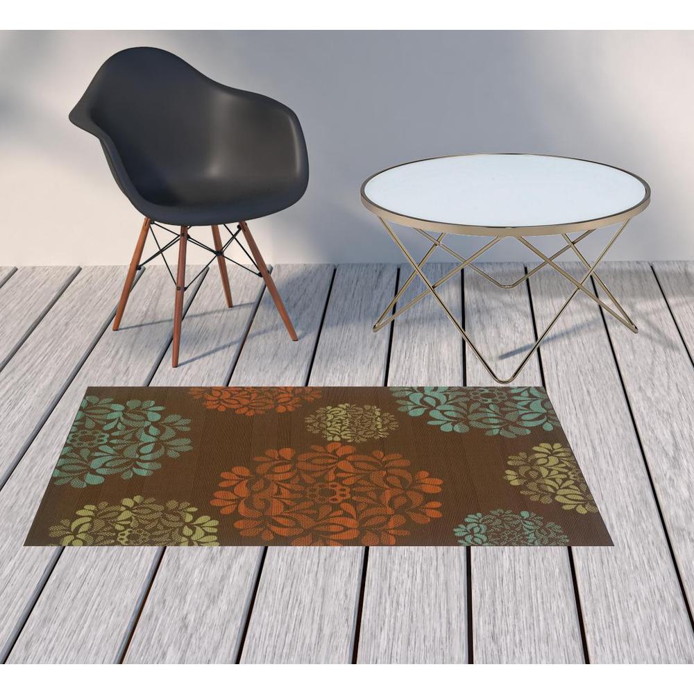 2' X 4' Brown Floral Stain Resistant Indoor Outdoor Area Rug. Picture 2