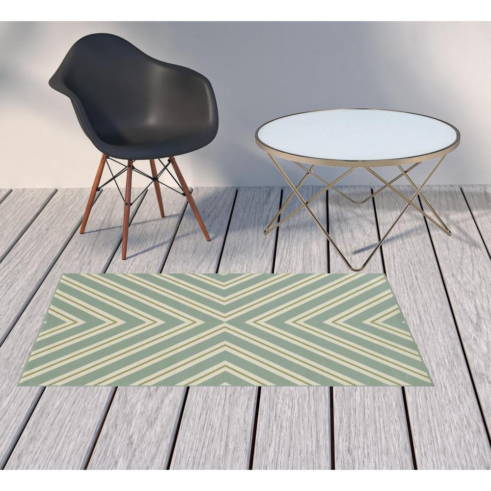 2' X 4' Blue and Green Geometric Stain Resistant Indoor Outdoor Area Rug. Picture 2