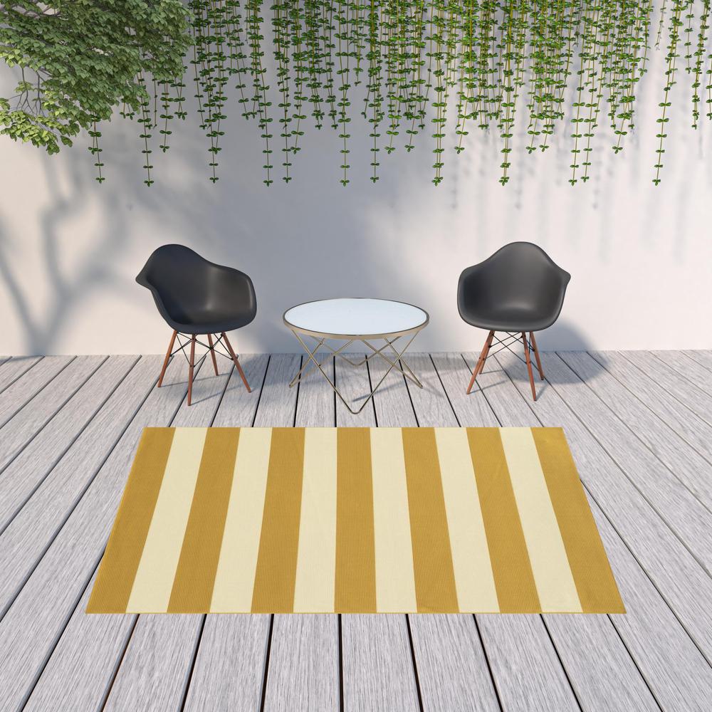 7' x 10' Gold and Ivory Geometric Stain Resistant Indoor Outdoor Area Rug. Picture 2
