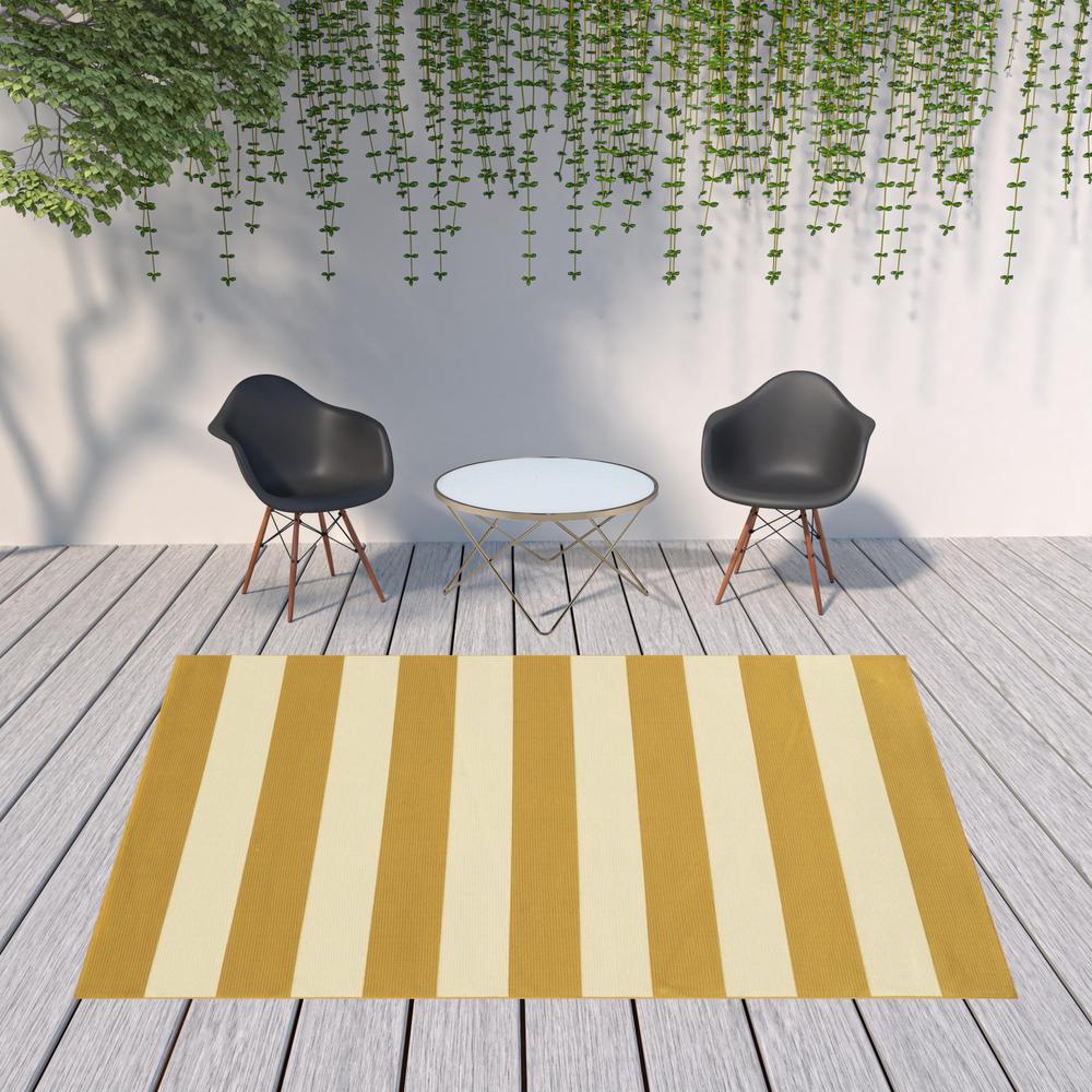 8' x 11' Gold and Ivory Geometric Stain Resistant Indoor Outdoor Area Rug. Picture 2