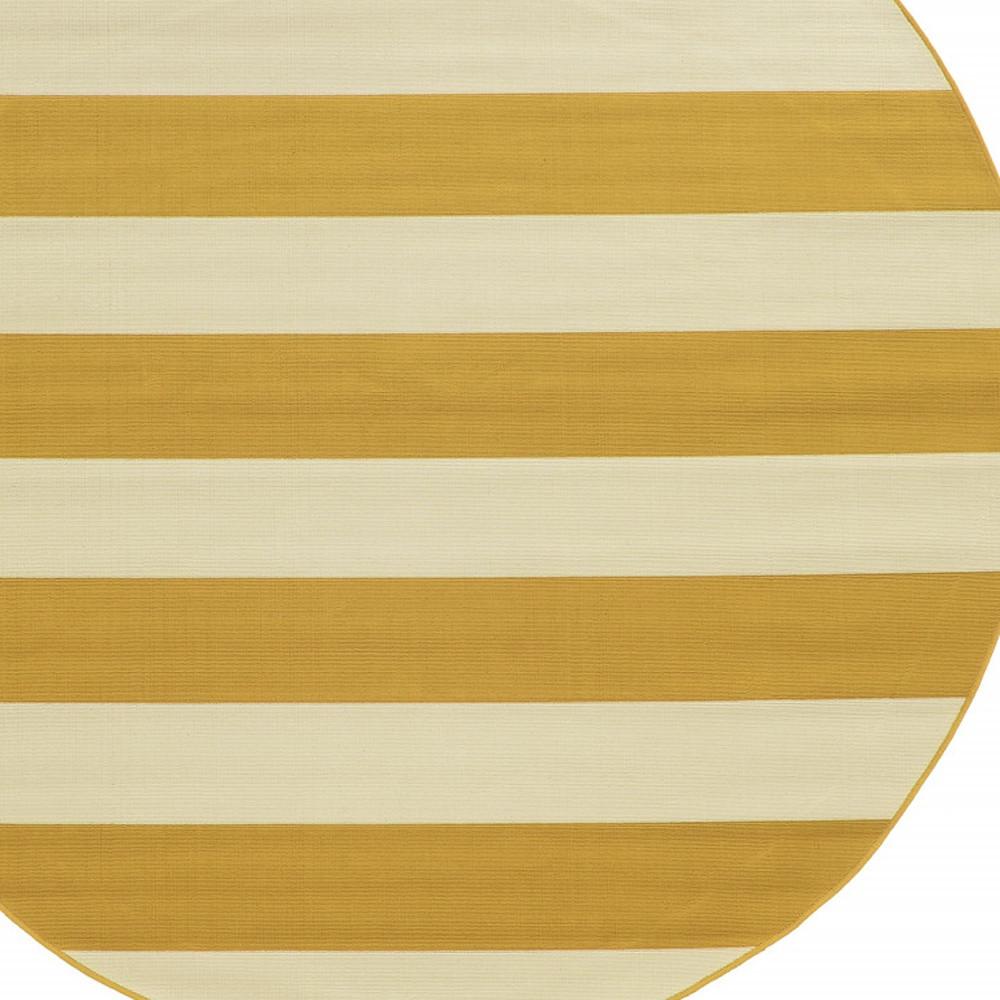 8' x 8' Gold and Ivory Round Geometric Stain Resistant Indoor Outdoor Area Rug. Picture 3