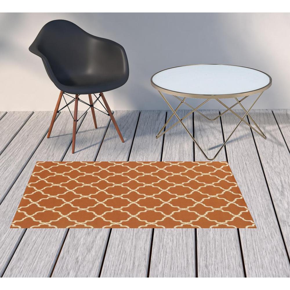 2' X 4' Brown and Ivory Geometric Stain Resistant Indoor Outdoor Area Rug. Picture 2