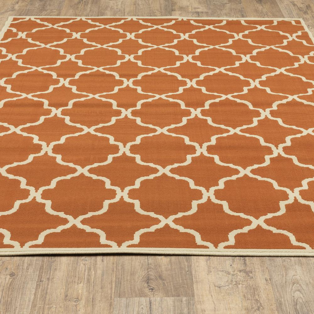 2' X 4' Brown and Ivory Geometric Stain Resistant Indoor Outdoor Area Rug. Picture 9