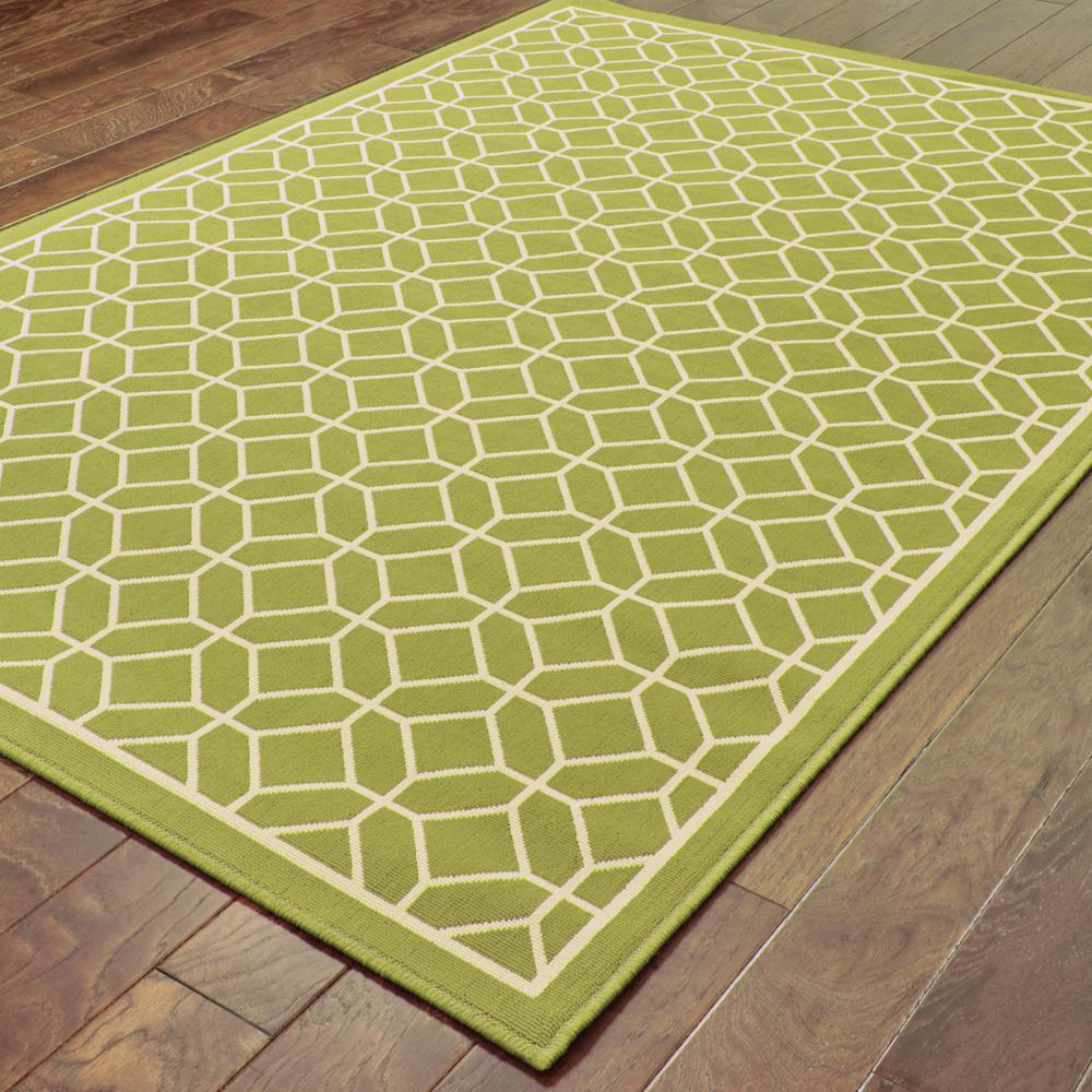 5' x 8' Green and Ivory Geometric Stain Resistant Indoor Outdoor Area Rug. Picture 4