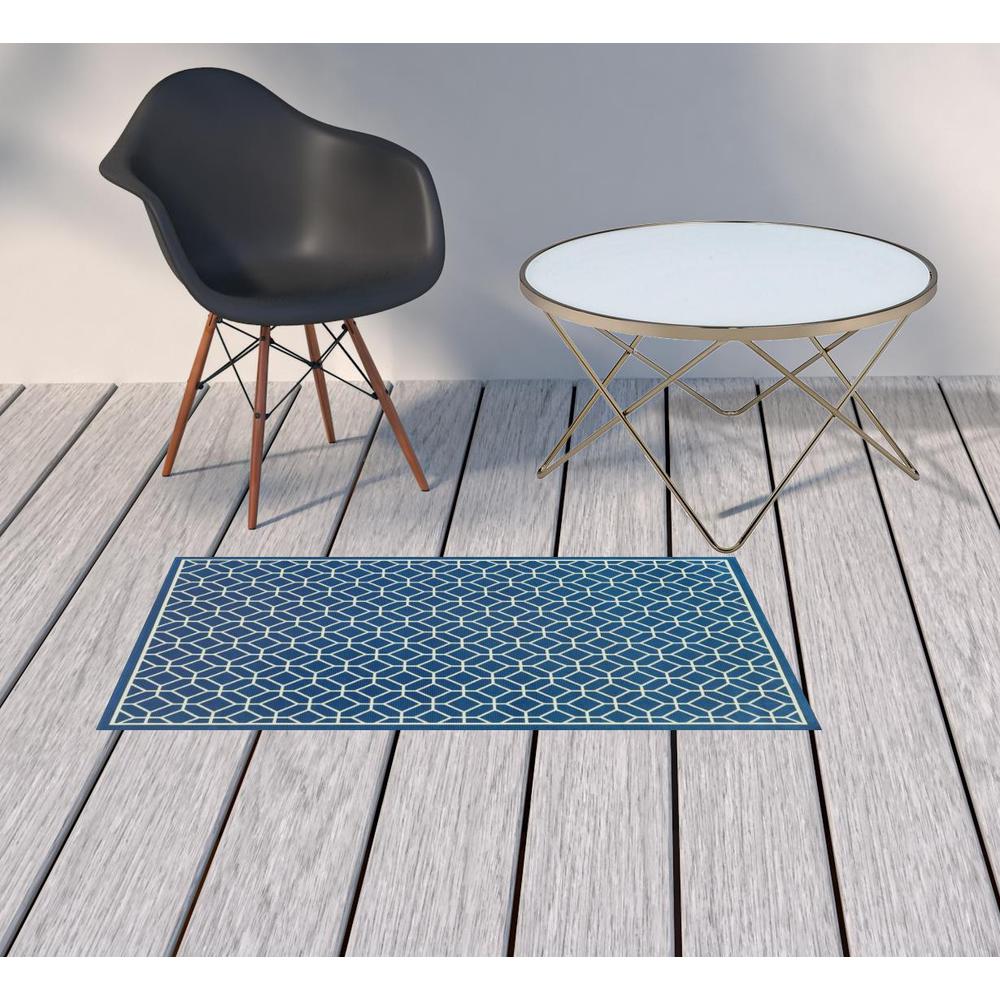 2' X 4' Blue and Ivory Geometric Stain Resistant Indoor Outdoor Area Rug. Picture 2