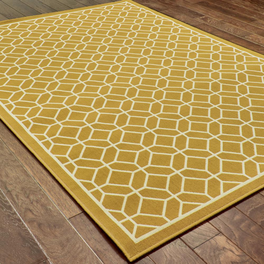 9' X 13' Gold and Ivory Geometric Stain Resistant Indoor Outdoor Area Rug. Picture 4