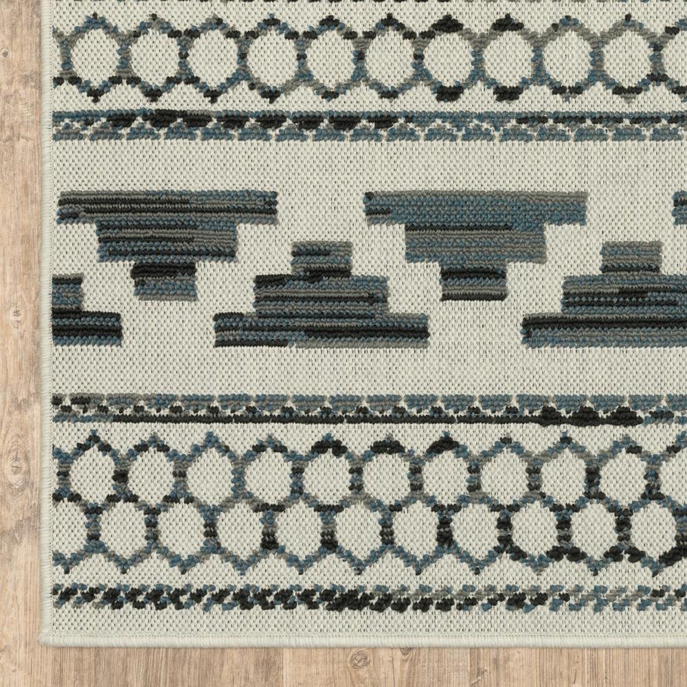 5' x 7' Blue and Beige Geometric Stain Resistant Indoor Outdoor Area Rug. Picture 4