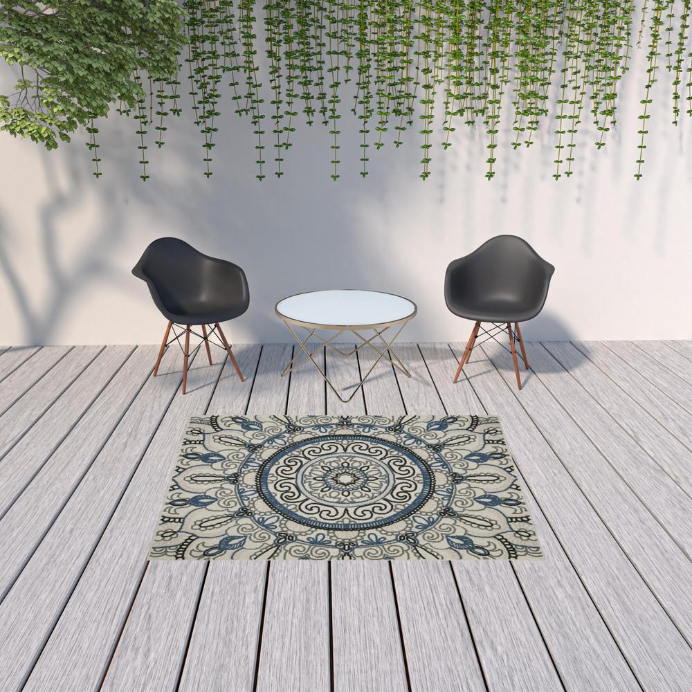 5' x 7' Blue and Beige Geometric Stain Resistant Indoor Outdoor Area Rug. Picture 2