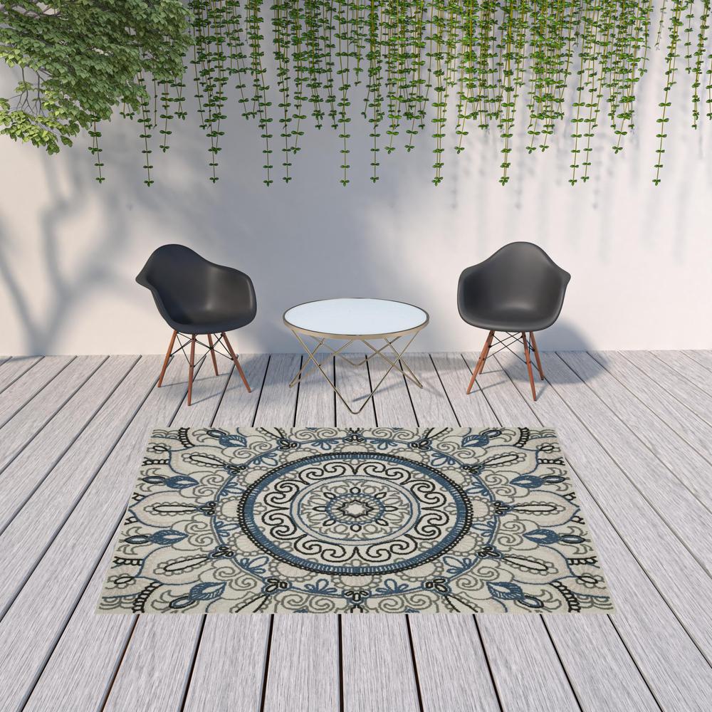 7' x 9' Blue and Beige Geometric Stain Resistant Indoor Outdoor Area Rug. Picture 2