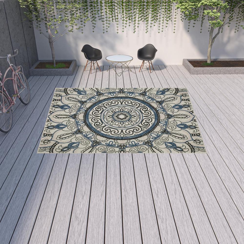 10' x 13' Blue and Beige Geometric Stain Resistant Indoor Outdoor Area Rug. Picture 2