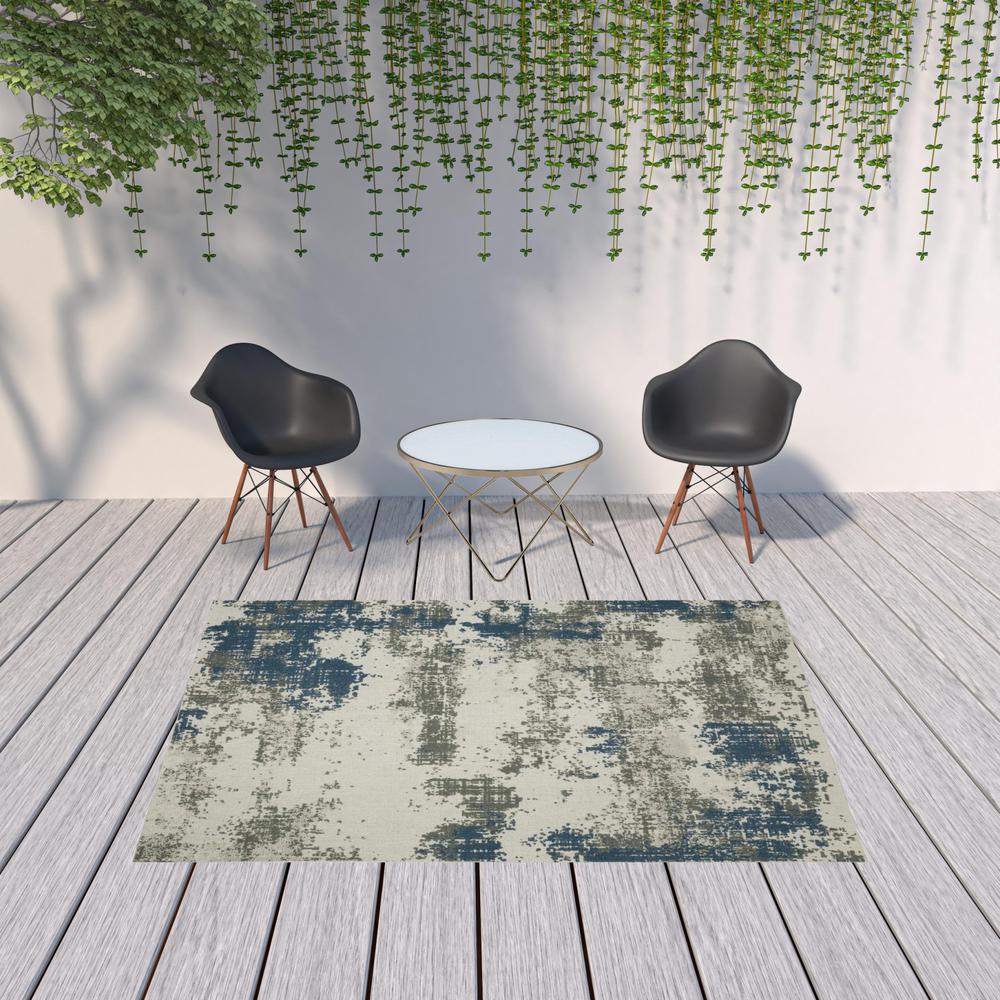 7' x 9' Blue and Beige Abstract Stain Resistant Indoor Outdoor Area Rug. Picture 2