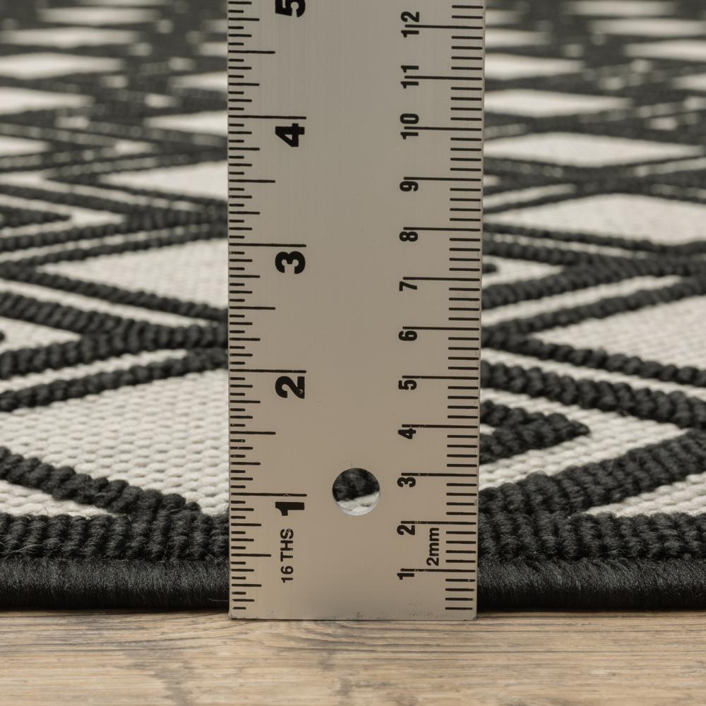 2' X 7' Beige and Black Geometric Stain Resistant Indoor Outdoor Area Rug. Picture 8