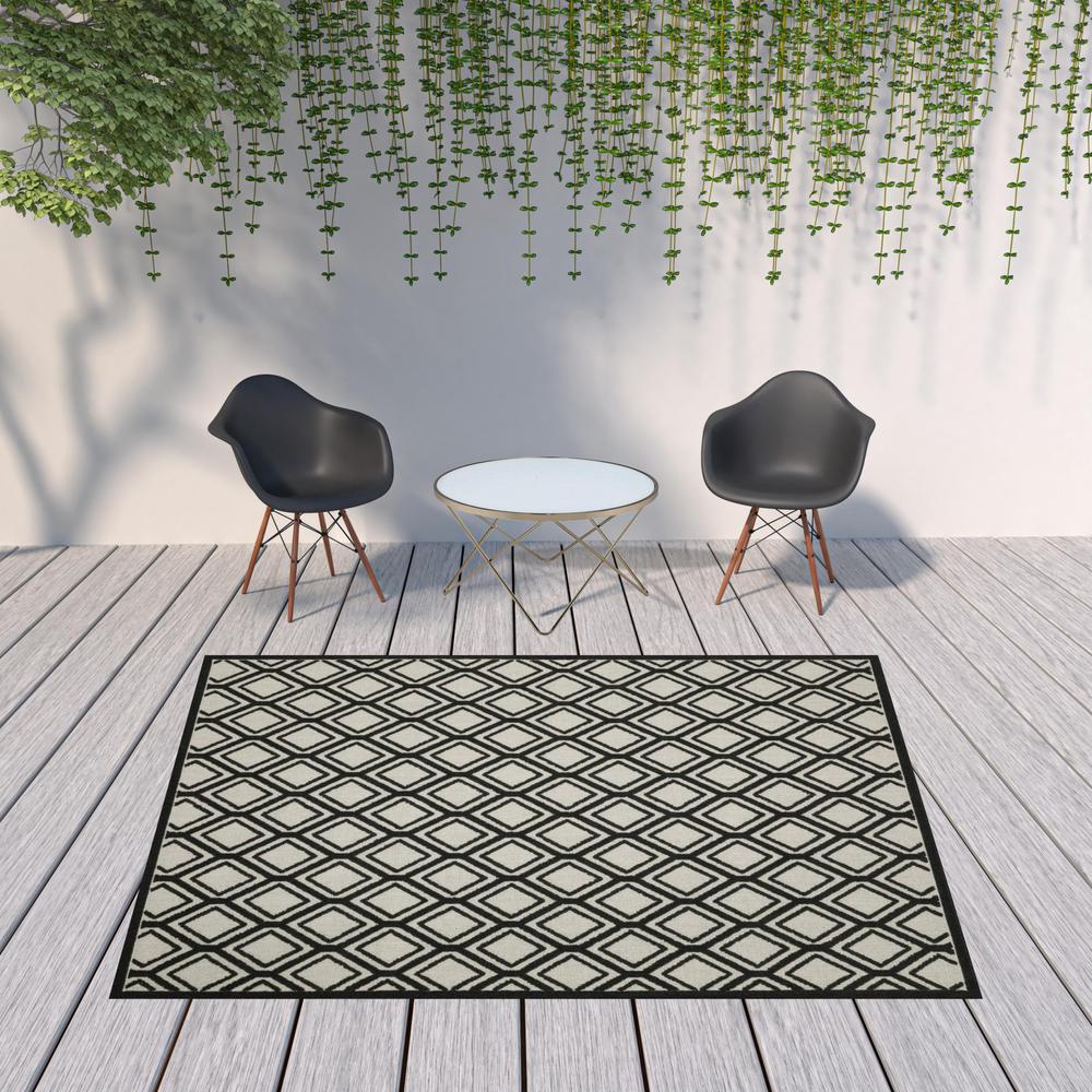 8' x 10' Beige and Black Geometric Stain Resistant Indoor Outdoor Area Rug. Picture 2