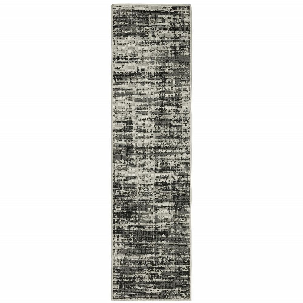 2' X 7' Beige and Black Abstract Stain Resistant Indoor Outdoor Area Rug. Picture 1