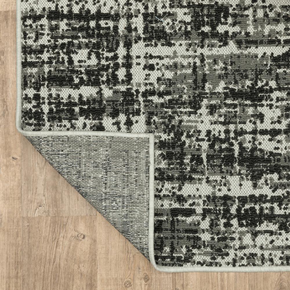 2' X 7' Beige and Black Abstract Stain Resistant Indoor Outdoor Area Rug. Picture 6
