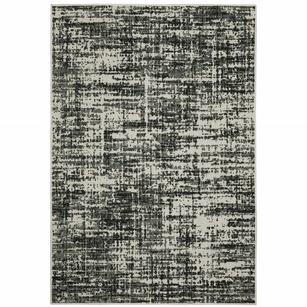 7' x 9' Beige and Black Abstract Stain Resistant Indoor Outdoor Area Rug. Picture 2