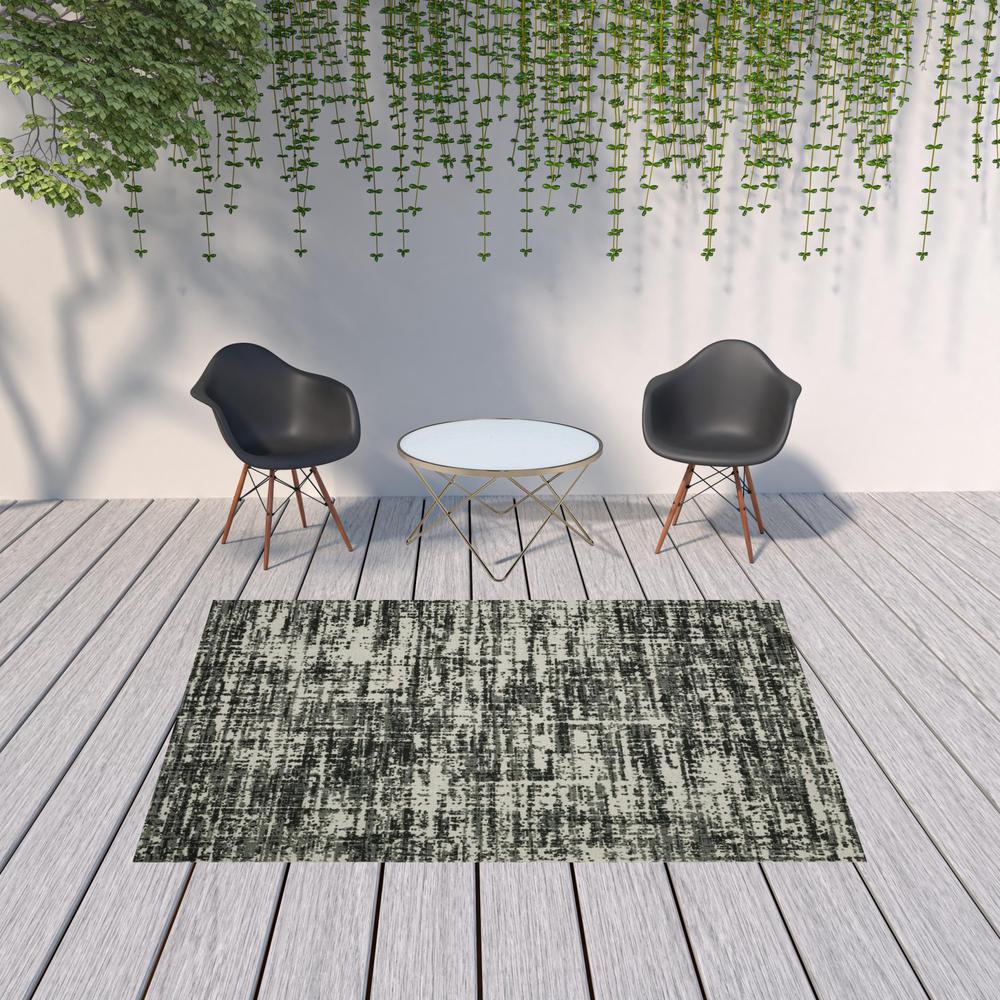7' x 9' Beige and Black Abstract Stain Resistant Indoor Outdoor Area Rug. Picture 3