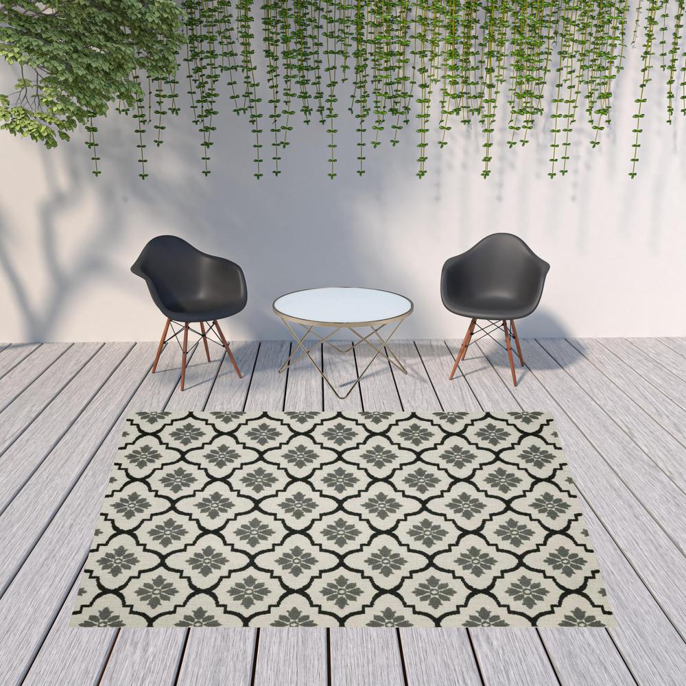 8' x 10' Beige and Black Geometric Stain Resistant Indoor Outdoor Area Rug. Picture 2