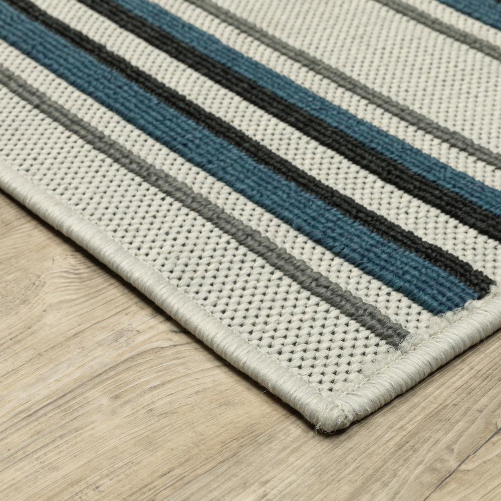 2' X 7' Blue and Beige Geometric Stain Resistant Indoor Outdoor Area Rug. Picture 5