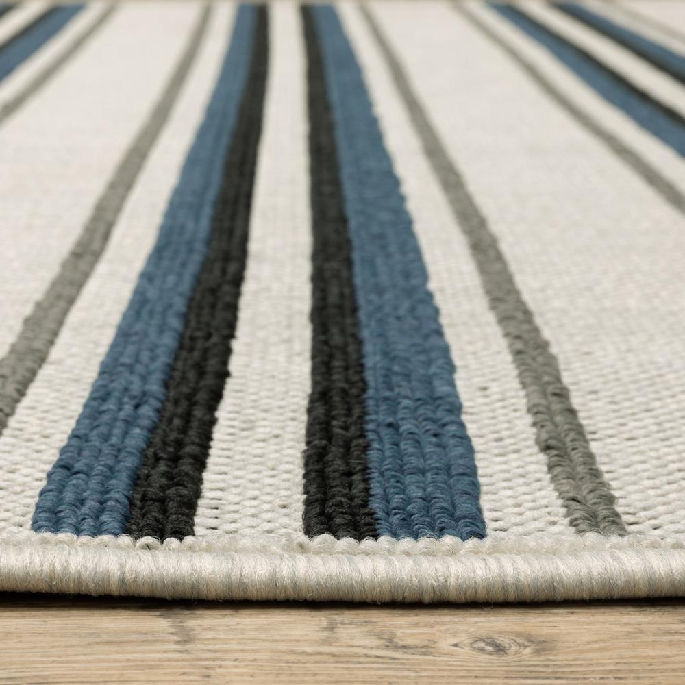 2' X 7' Blue and Beige Geometric Stain Resistant Indoor Outdoor Area Rug. Picture 6
